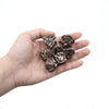 7pcs Coppery Skull Metal Dice Set - Crafted with Premium Metal, Unique Hollow Polyhedral Design, and Exquisite Details - Ideal for Immersive Role-Playing, RPG, Board Games, and Card Games