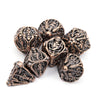 7pcs Coppery Skull Metal Dice Set - Crafted with Premium Metal, Unique Hollow Polyhedral Design, and Exquisite Details - Ideal for Immersive Role-Playing, RPG, Board Games, and Card Games